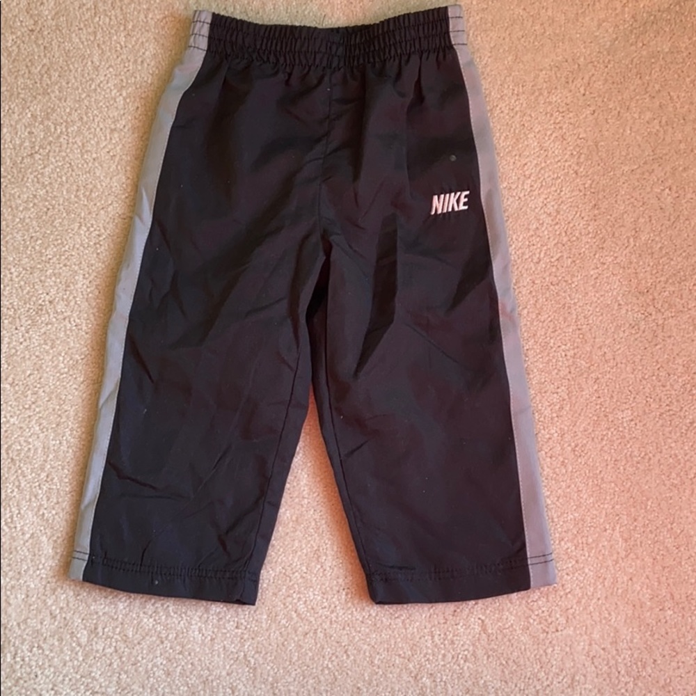 Nike pants with mesh on inside.